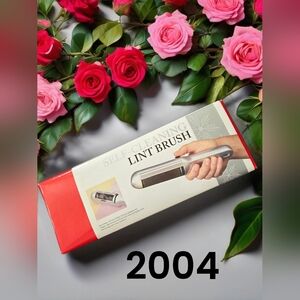 Vintage 2004 self-cleaning lint brush new never opened